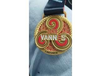 La médaille de Christian au 20 km de Vannes